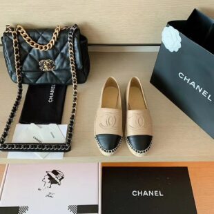 Face-masked customers formed huge queues outside Chanel stores in China and Seoul despite COVID-19