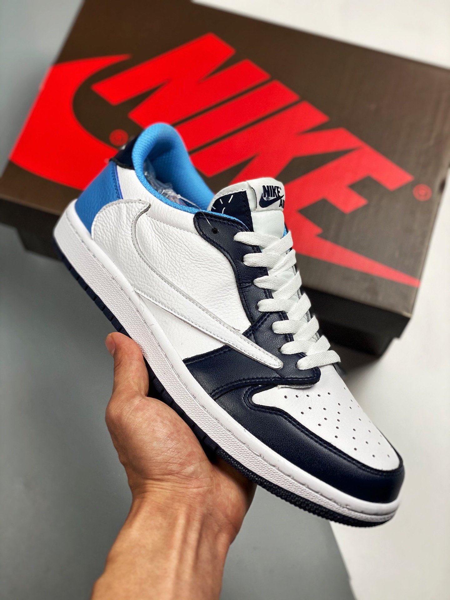 Travis Scott x Air Jordan stealth 1 Low UNC White Navy Blue - Shin ...