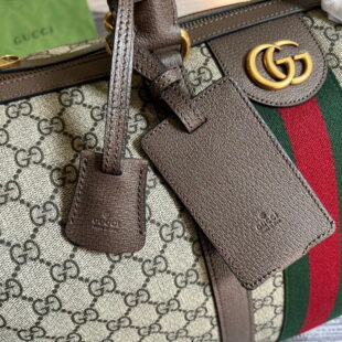 Gucci monogram leather purse