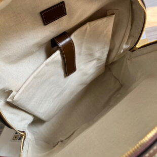 Gucci handbag in beige monogram canvas and orange leather