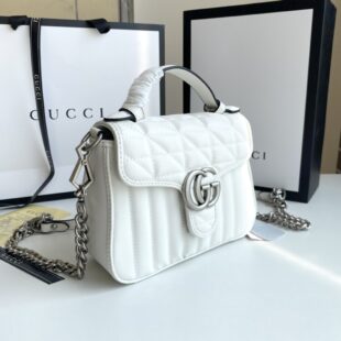Gucci Gucci Vintage handbag in beige and black canvas and black leather