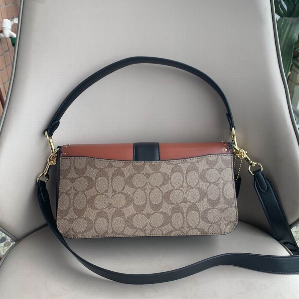 georgie shoulder bolsa in colorblock signature canvas with rivets