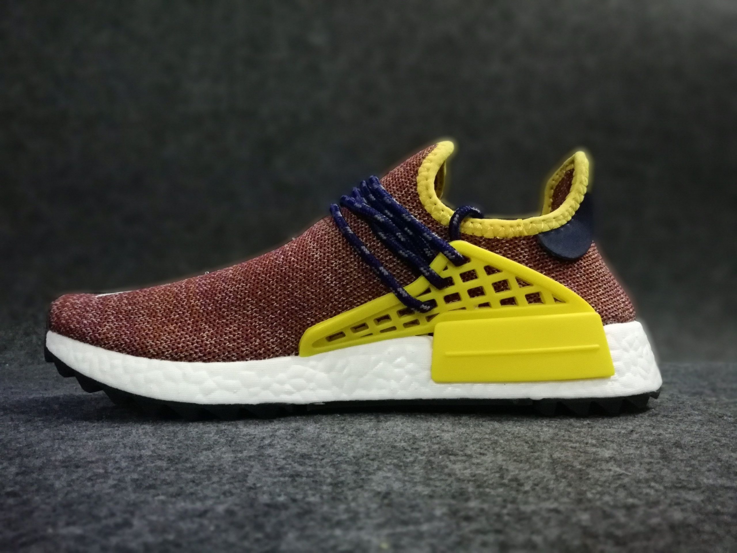 brown human race shoes